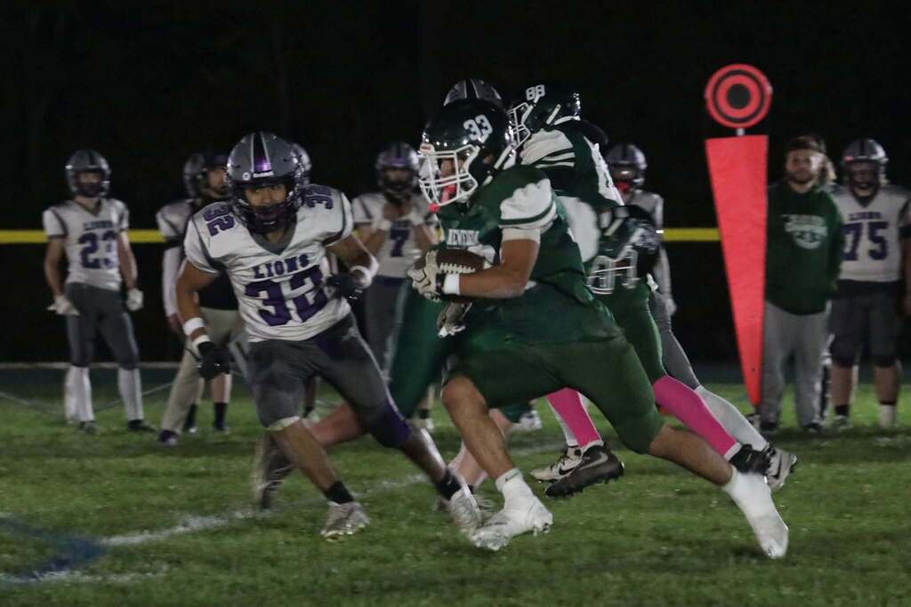a football player running the ball