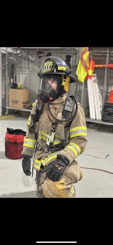 Student volunteering at fire department