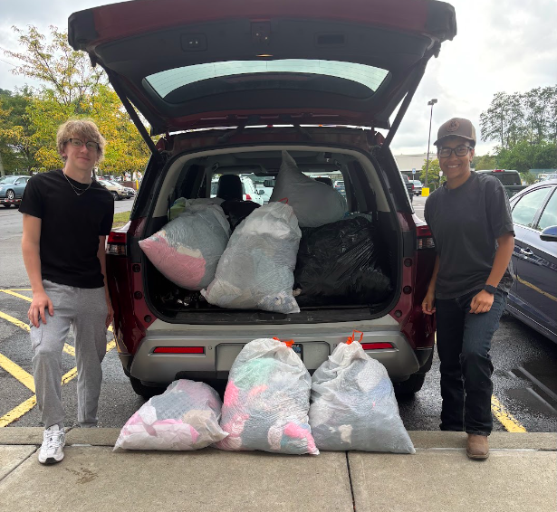 Students volunteering at clothing drive