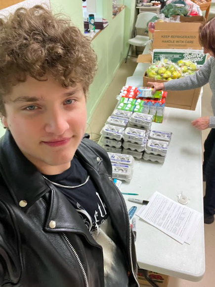 Student volunteering at food pantry