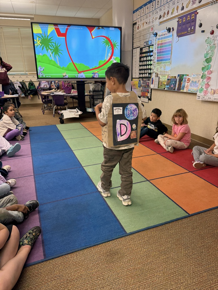 Student showing their ABC’s.