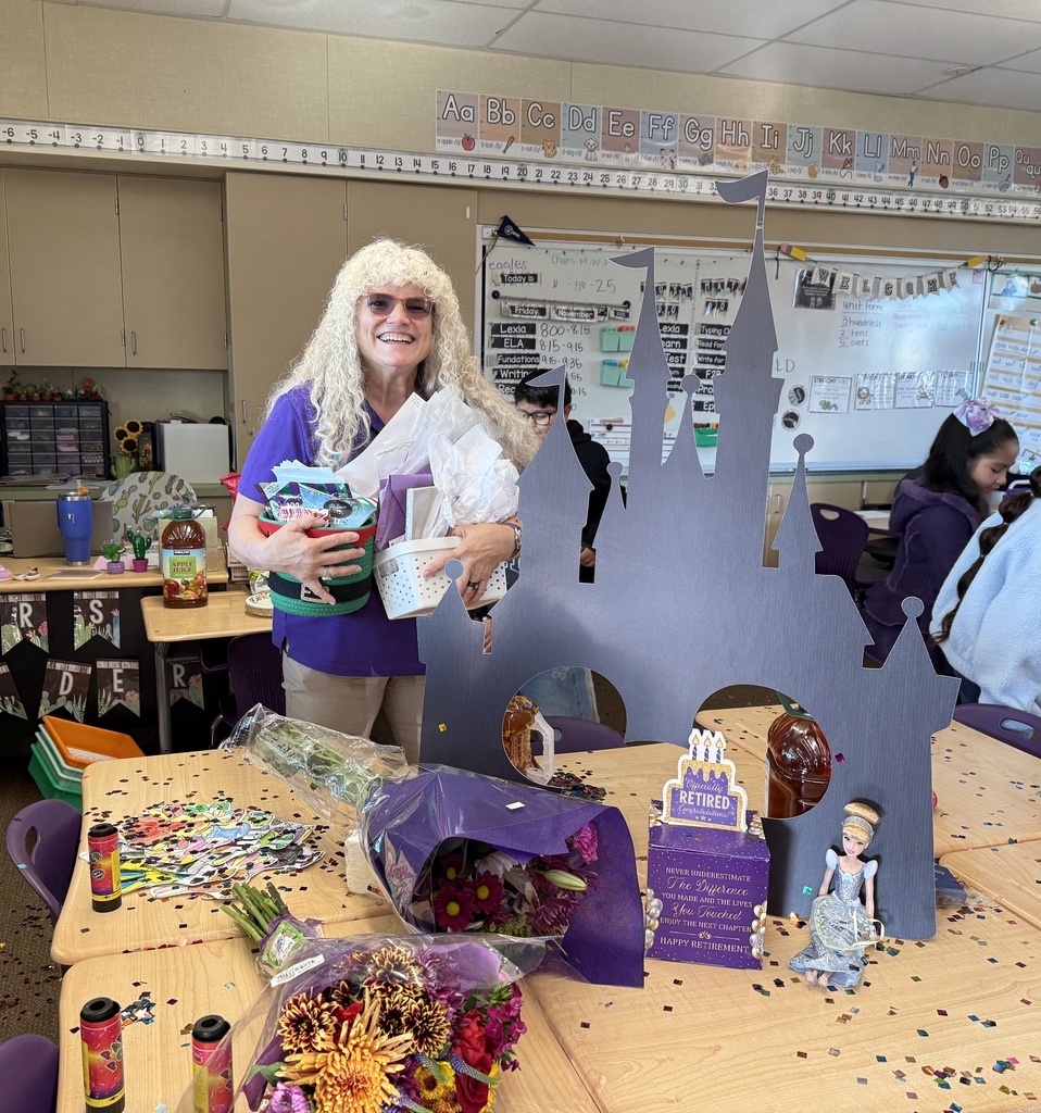 Teacher reciving gifts for retirement.