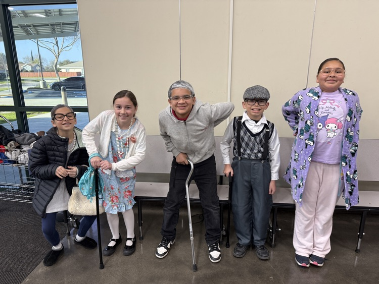Students dressed like they are 100 years old.