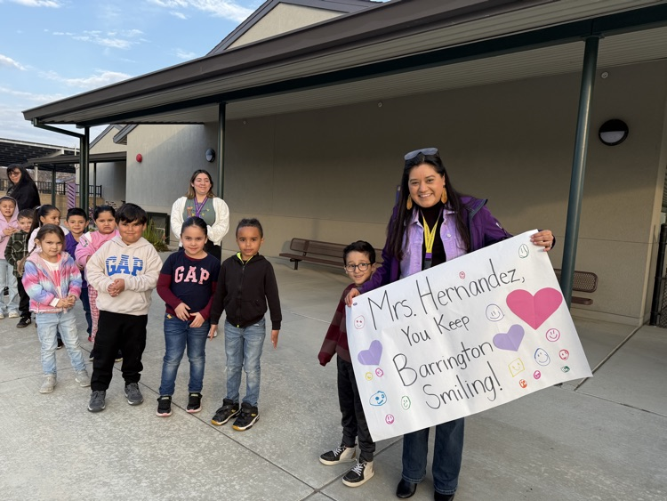 Mrs, Hernandez getting gifts. 