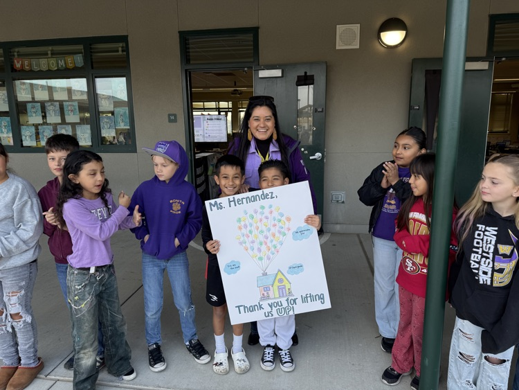 Mrs, Hernandez getting gifts. 