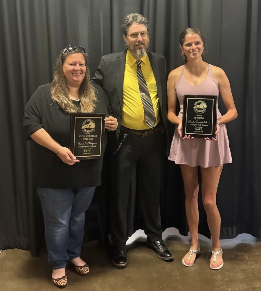 Jennifer Prejean and Dawn Cropenbaker are presented their awards by Dusty Galloway