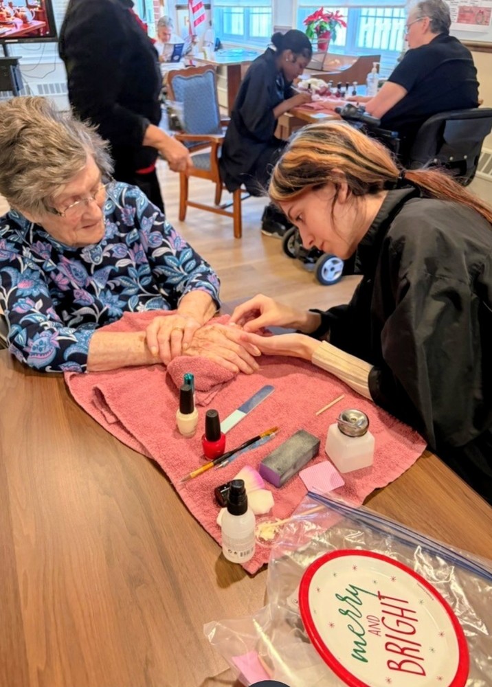 NACTC Cosmetology Students Give Manicures To Residents At The John Clarke Senior Living Center