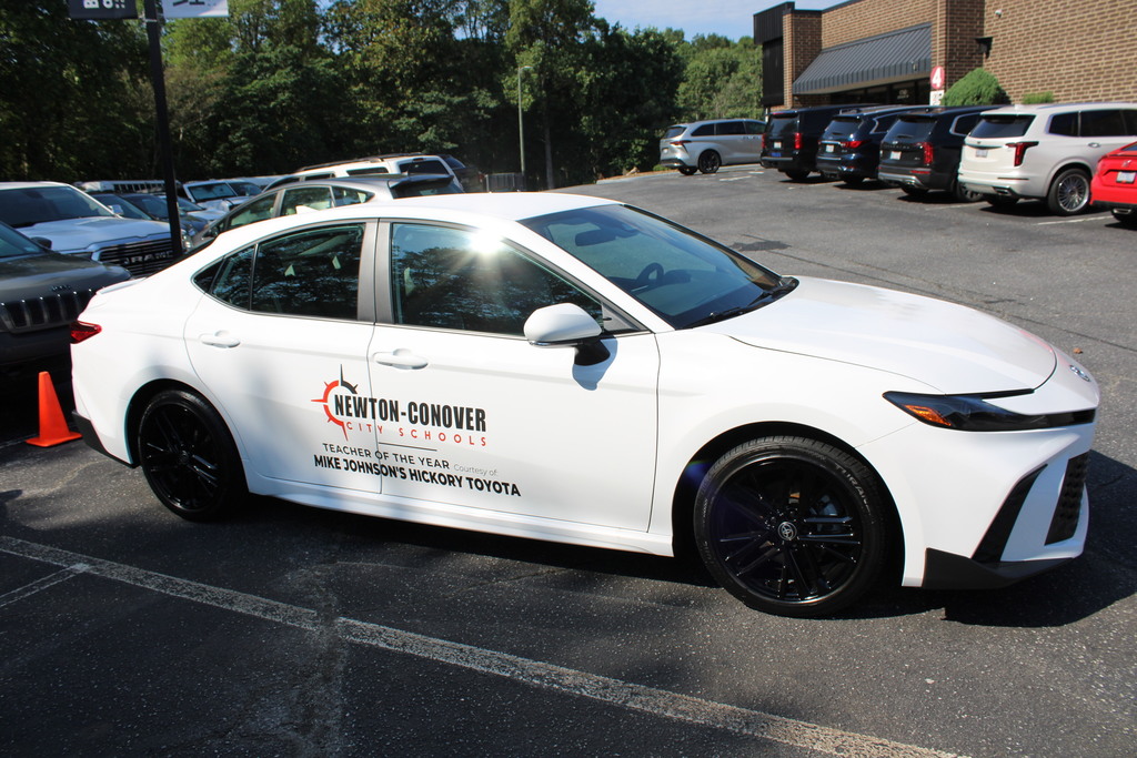 TOY CAR COURTESY OF MIKE JOHNSON'S TOYOTA