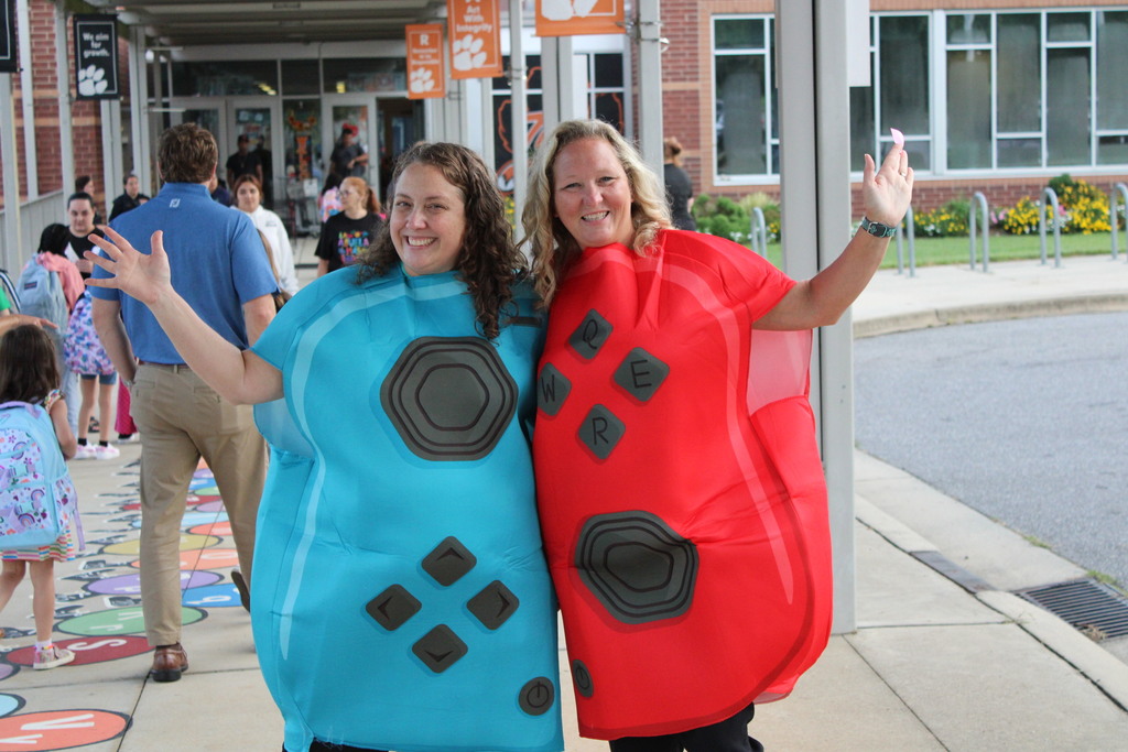 HAPPY STAFF TO GREET STUDENTS