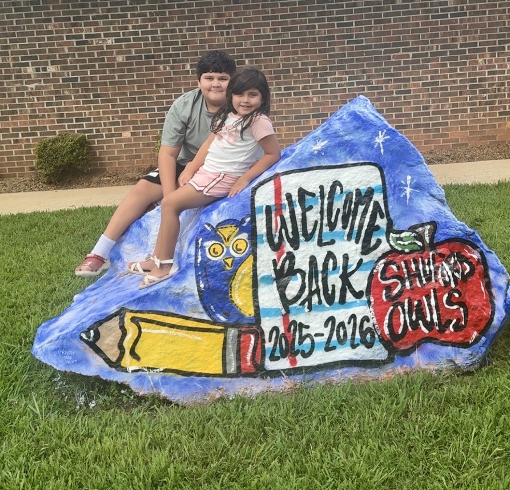 XAVIERGRADE 8 AND OLIVIA GRADE 1