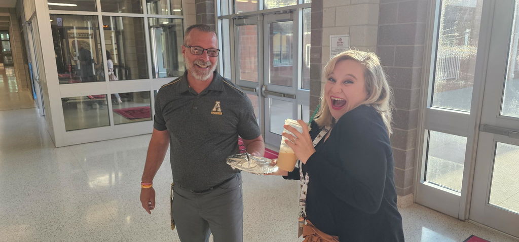 Mr. Whitener presents Ms. Isaac with her breakfast