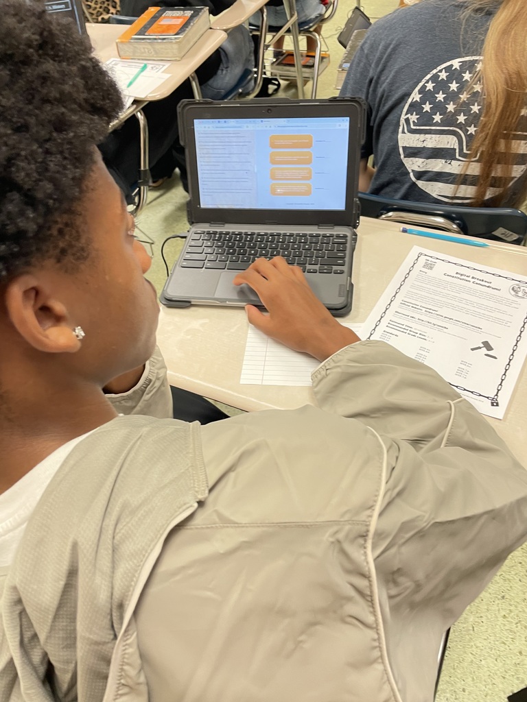 BARRY'S STUDENTS HARD AT WORK SOLVING CLUES