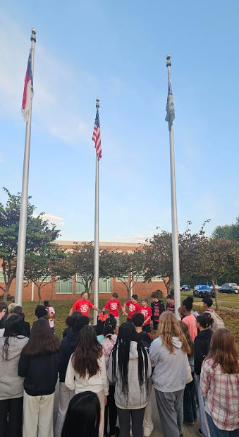 Students at the pole
