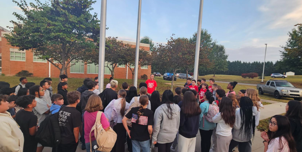 Students at the pole