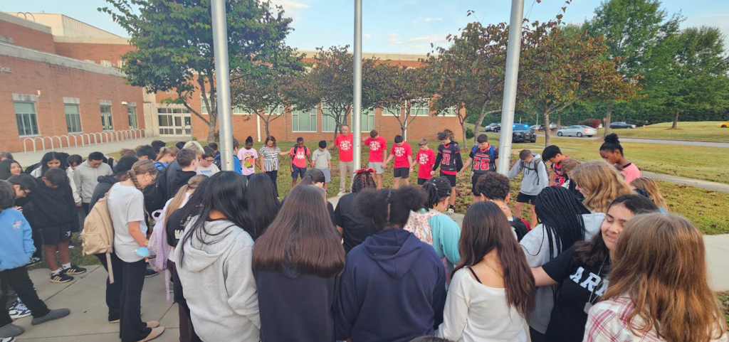 Students at the pole
