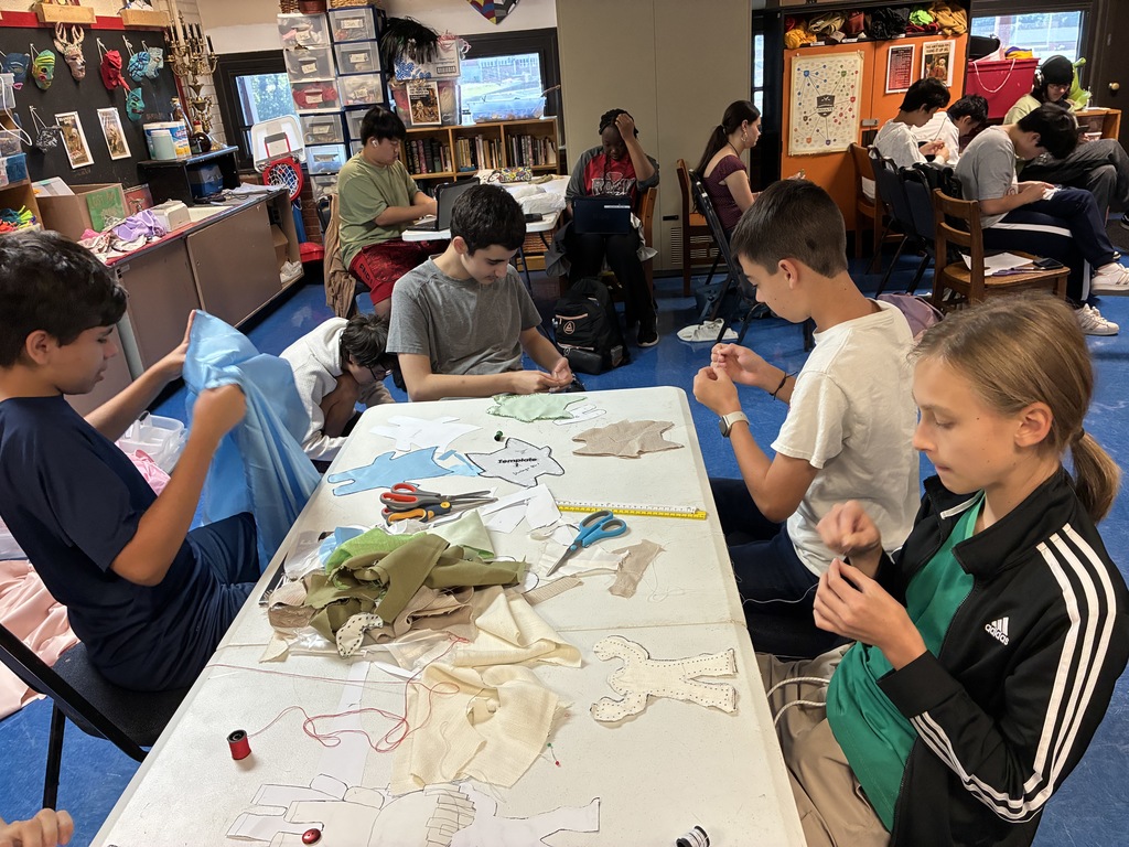 Students in Ms. Isaac's class learn to sew