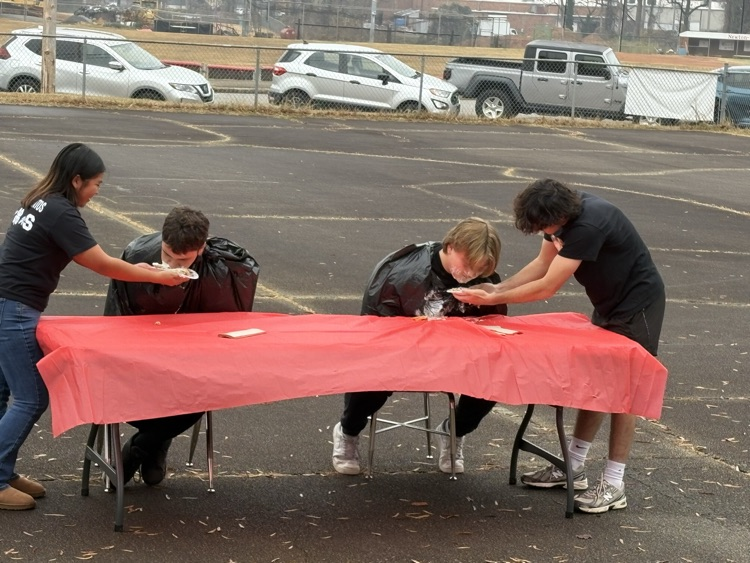 Joaquin and Aidan competing in the pie eating contest 