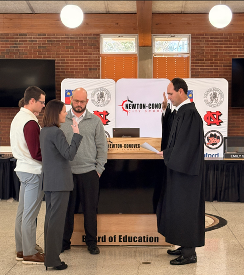 Dr. Emily Shaw is being sworn in as superintendent of Newton-Conover City Schools.