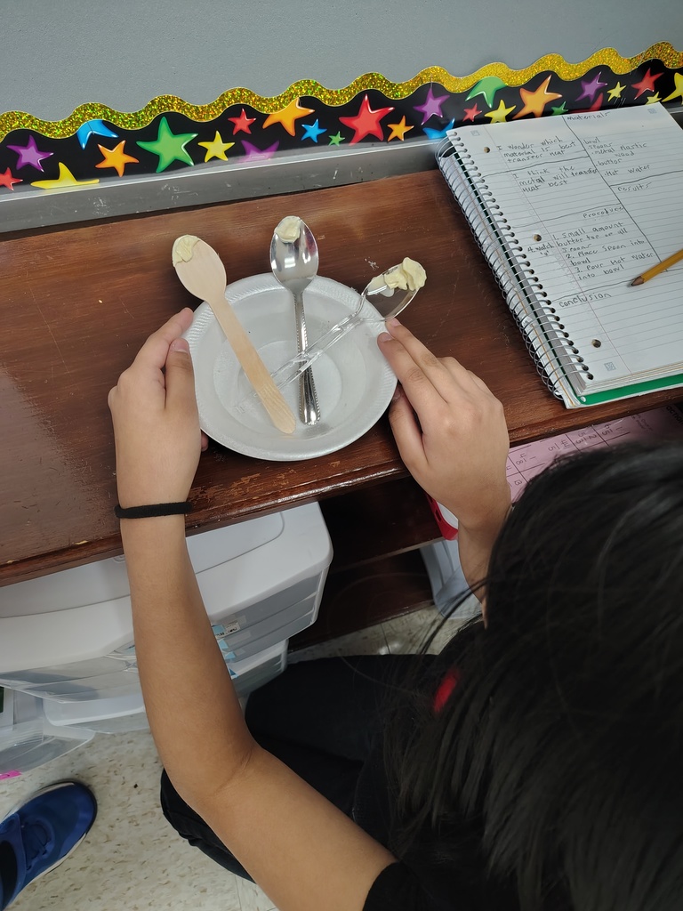 Mrs. White's 5th graders conducting experiments to learn more about thermal energy.