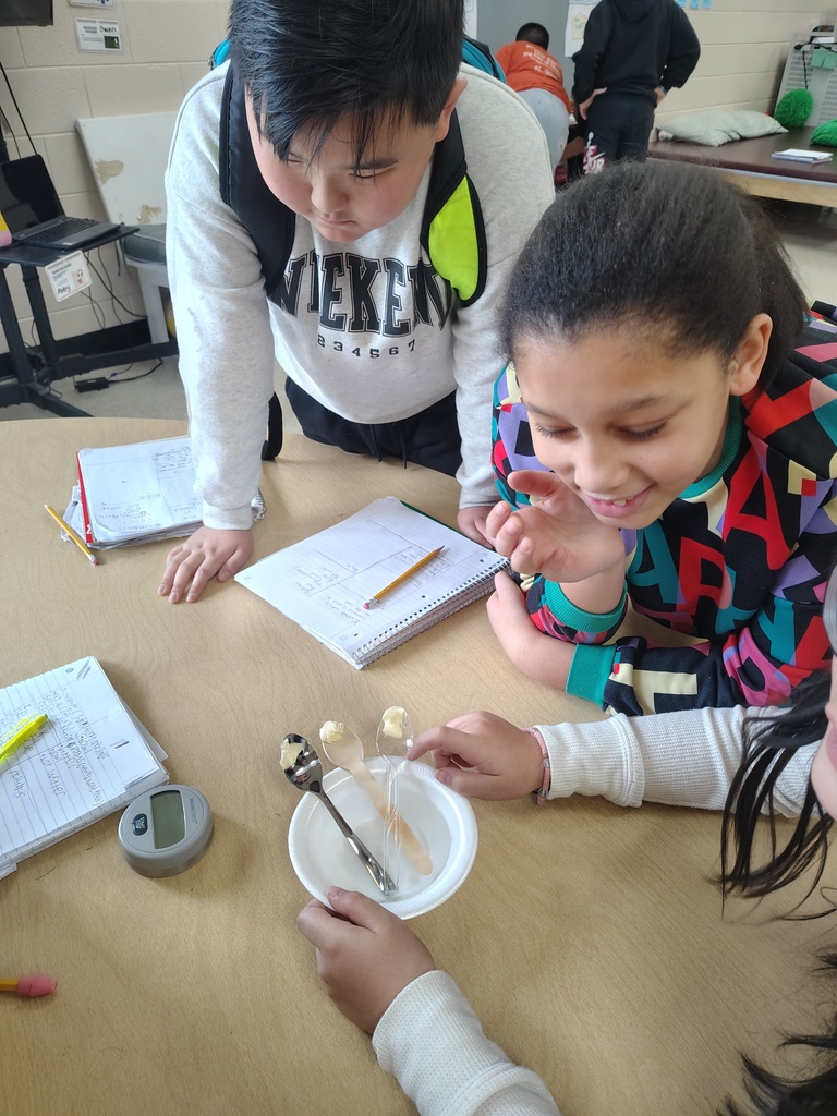 Mrs. White's 5th graders conducting experiments to learn more about thermal energy.