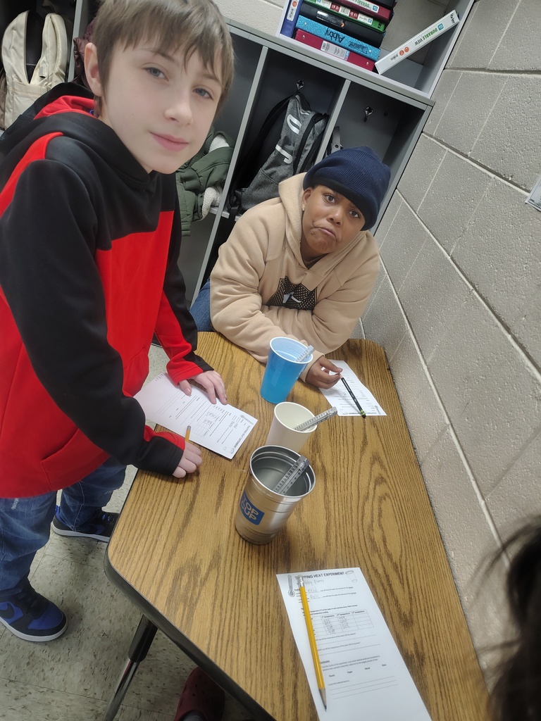 Mrs. White's 5th graders conducting experiments to learn more about thermal energy.