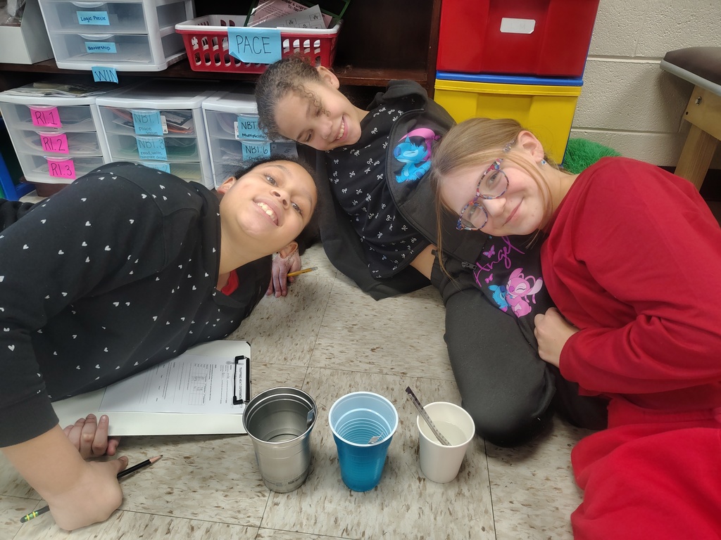 Mrs. White's 5th graders conducting experiments to learn more about thermal energy.