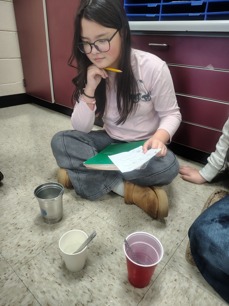 Mrs. White's 5th graders conducting experiments to learn more about thermal energy.