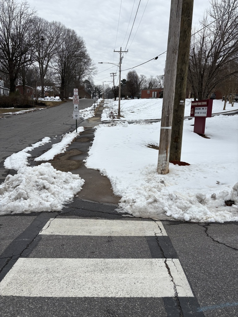 Sidewalk at the corner of North Ashe and West 18th