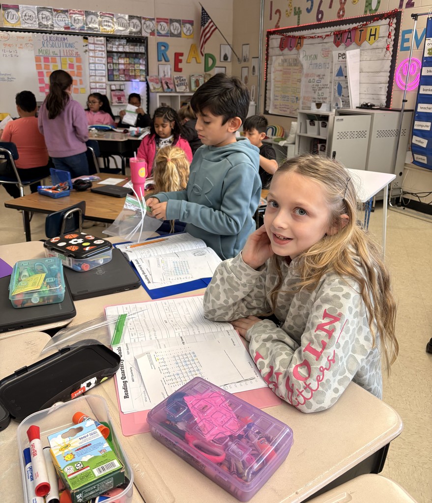 Kids at Shuford working on data notebooks.