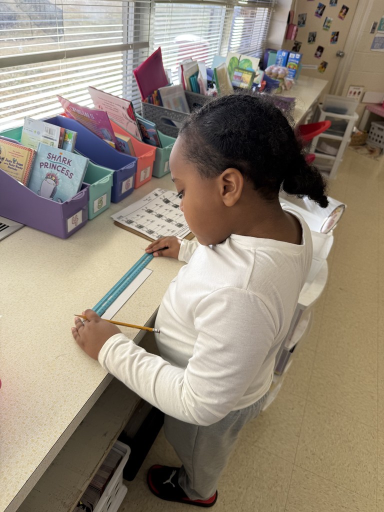 Mrs. Smyre's 2nd graders, working on their measurement unit.