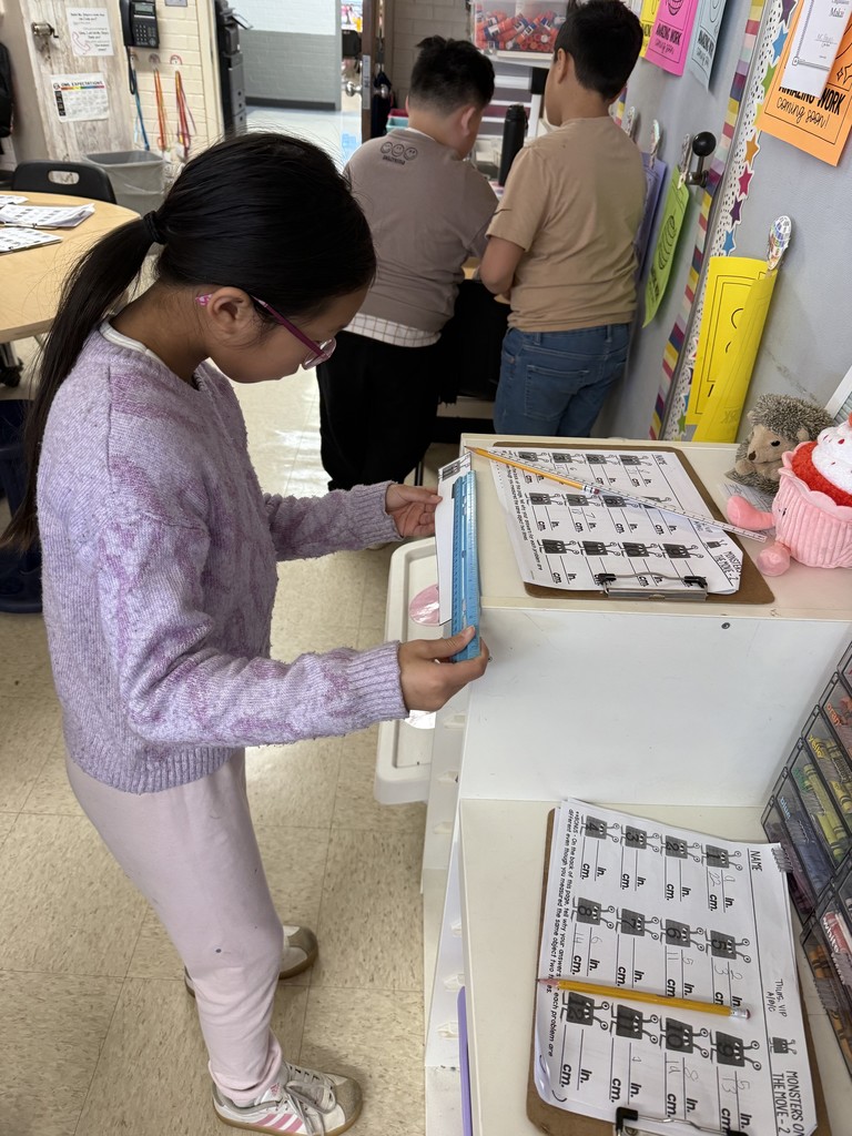 Mrs. Smyre's 2nd graders, working on their measurement unit.