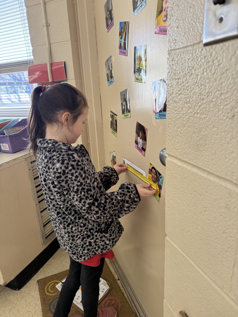 Mrs. Smyre's 2nd graders, working on their measurement unit.
