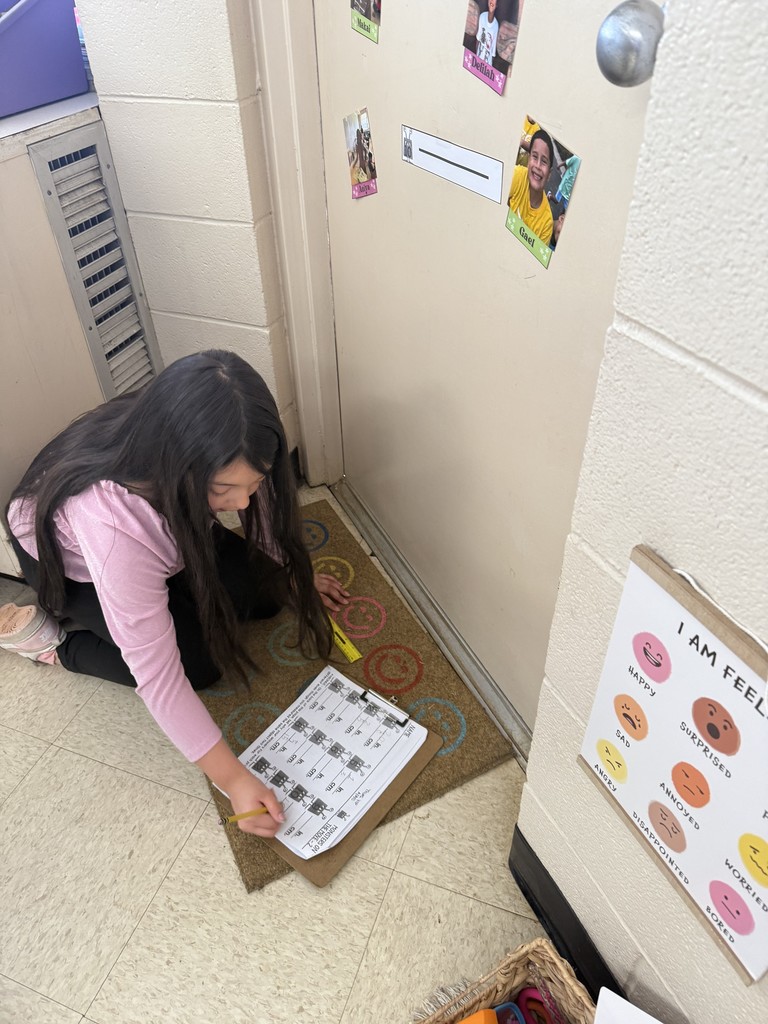 Mrs. Smyre's 2nd graders, working on their measurement unit.