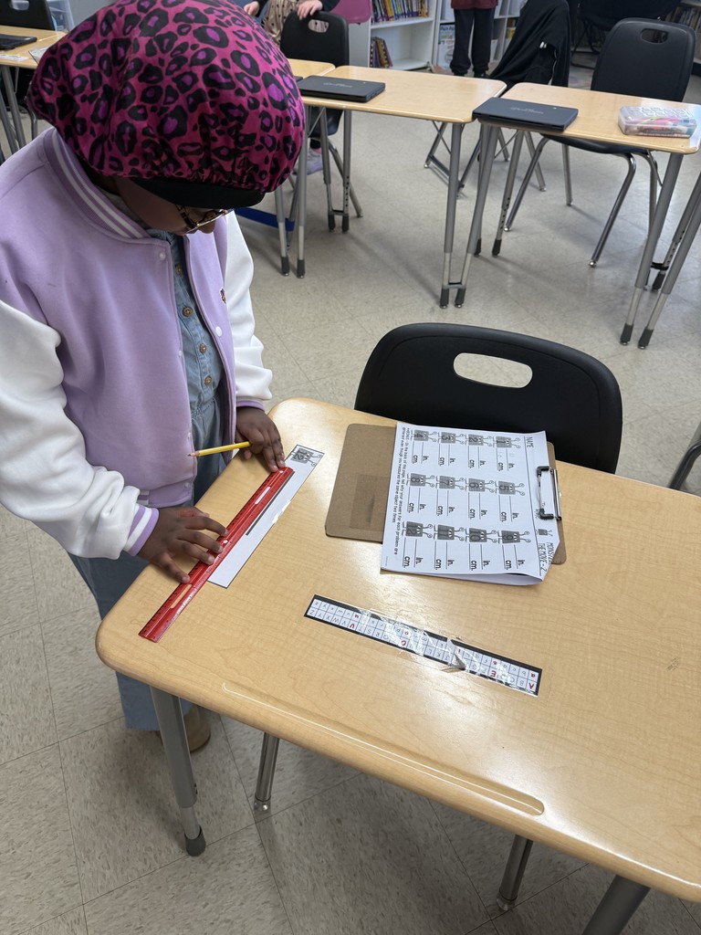 Mrs. Smyre's 2nd graders, working on their measurement unit.