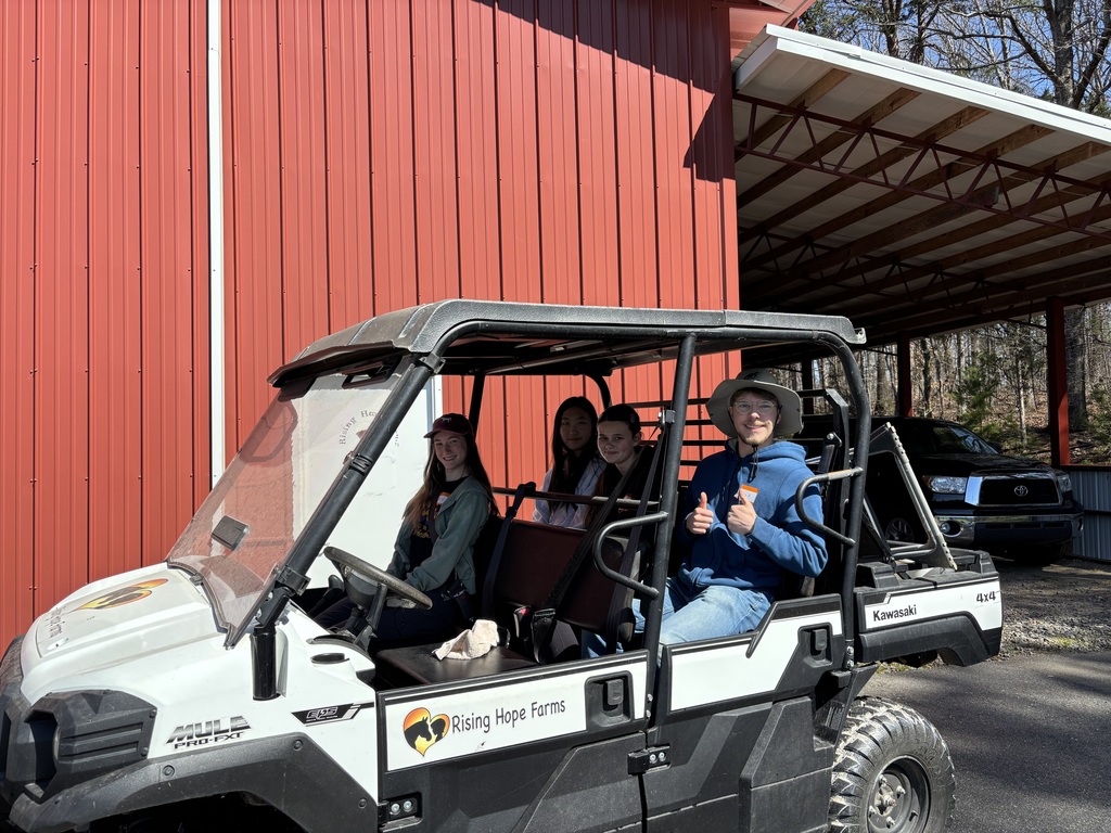 DHS students volunteering at Rising Hope Farms