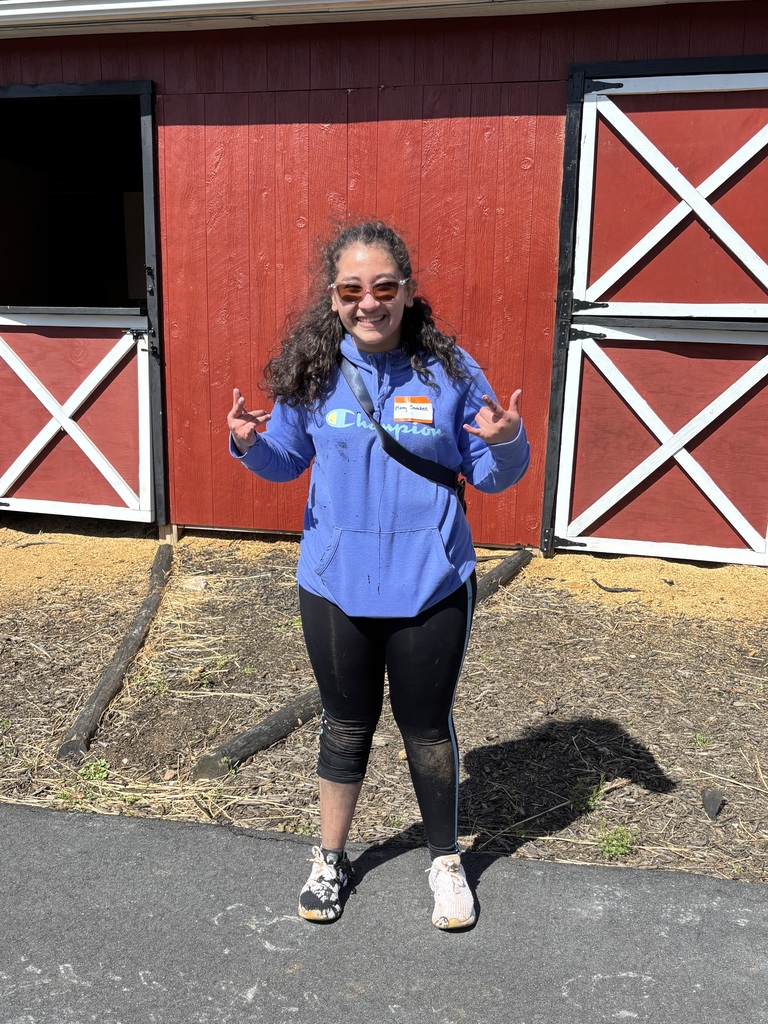DHS student, Elany, volunteers at Rising Hope Farms