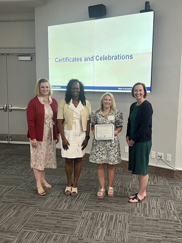 Jessica Sherrill being recognized for completing the Advanced Pathway of the Office of Exceptional Children Leadership Institute hosted by NCDPI.