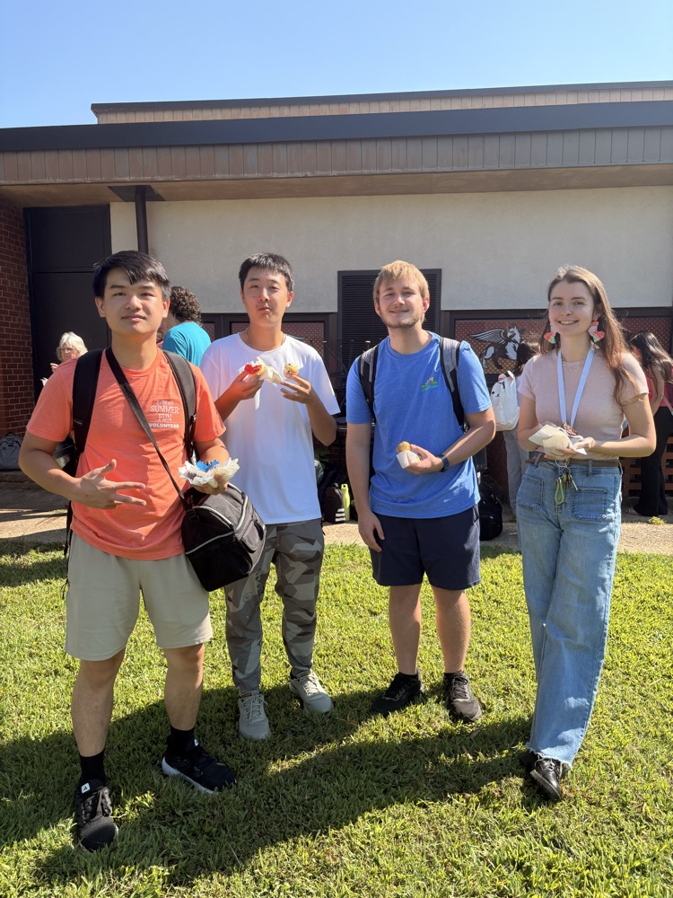 Jason, Gary, Mitchell and Ms. Isenhour with their cupcakes