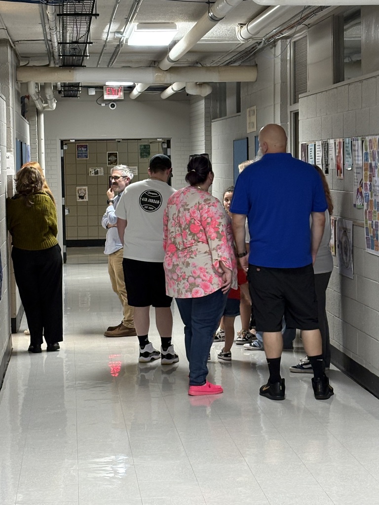 Parents waiting to go into Ms. Greenwald's room