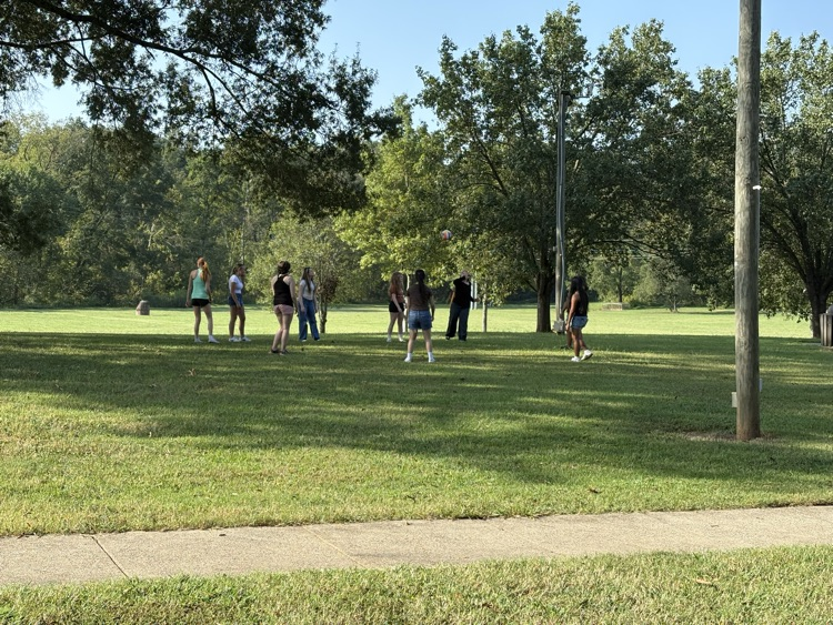 Students playing volleyball