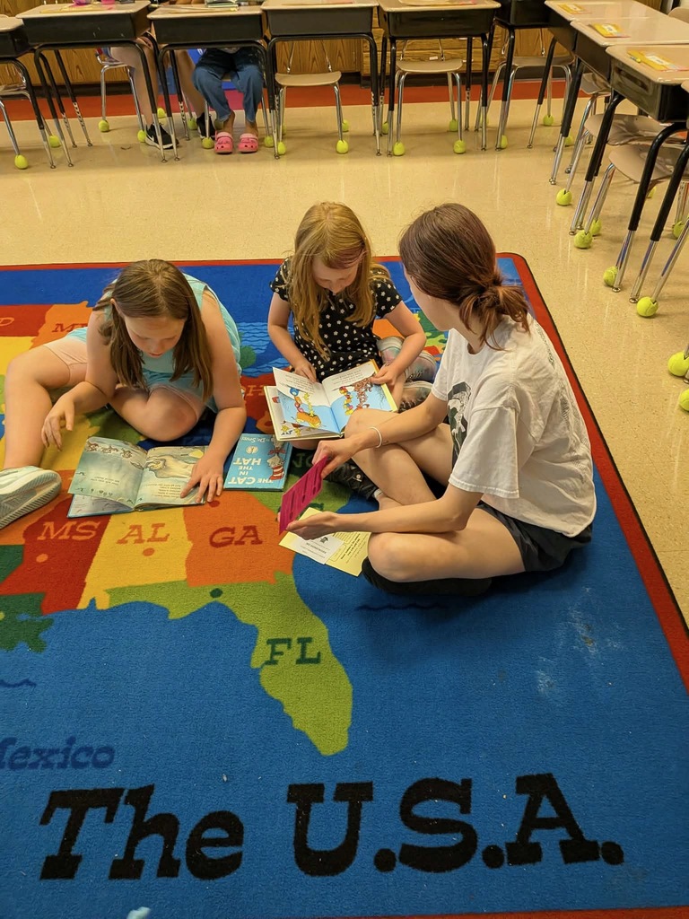 elementary students reading books