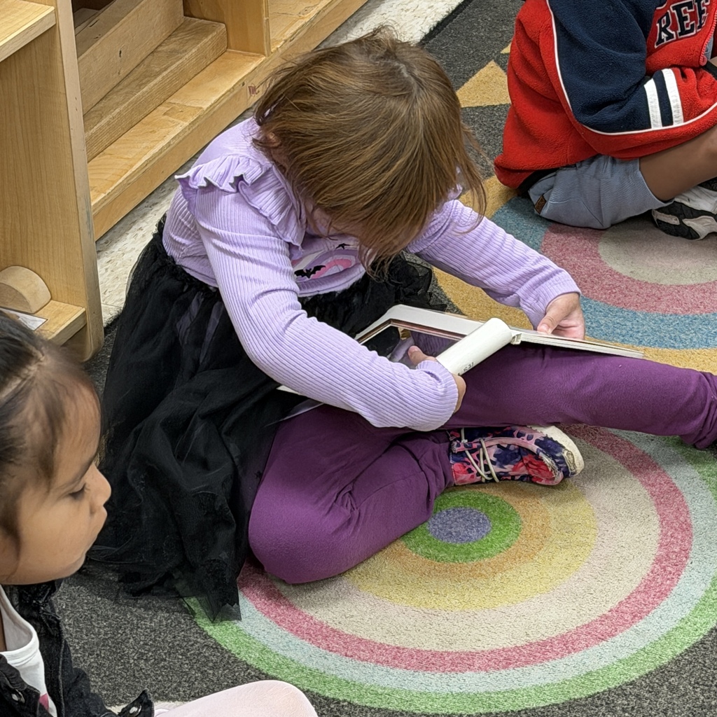 elementary students reading books
