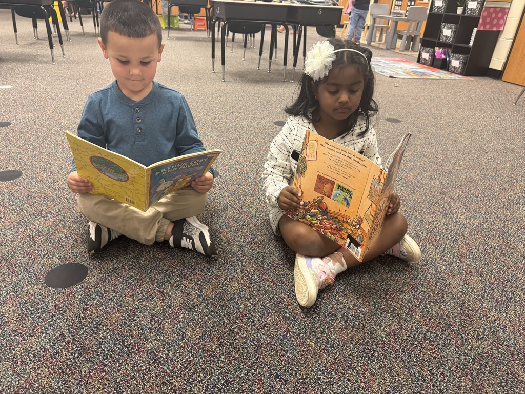 elementary students reading books