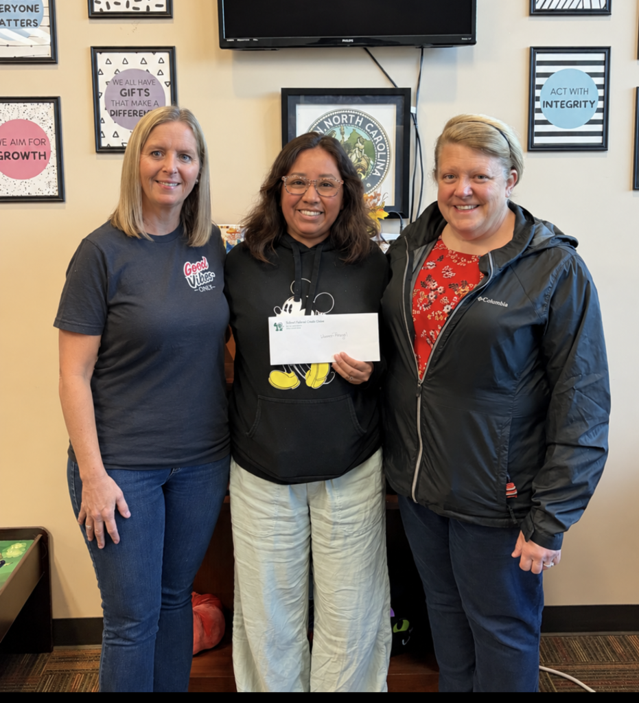 Jazmin Rangel was presented with a $500 giftcard to Food Lion from Shuford Credit Union.