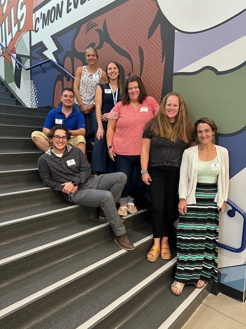 teachers smiling for a picture