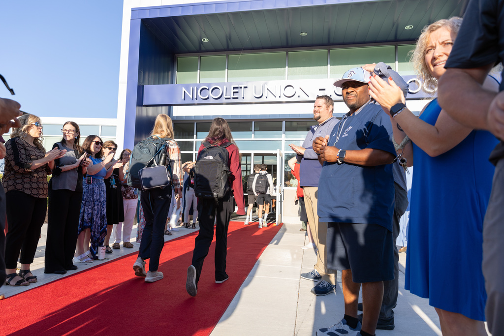 students walking down the red carpet