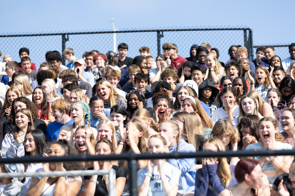 a picture of students cheering