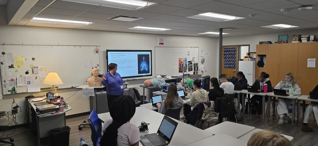 a nurse teaching a class
