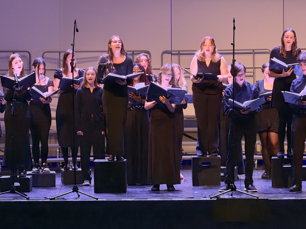 a picture of students singing