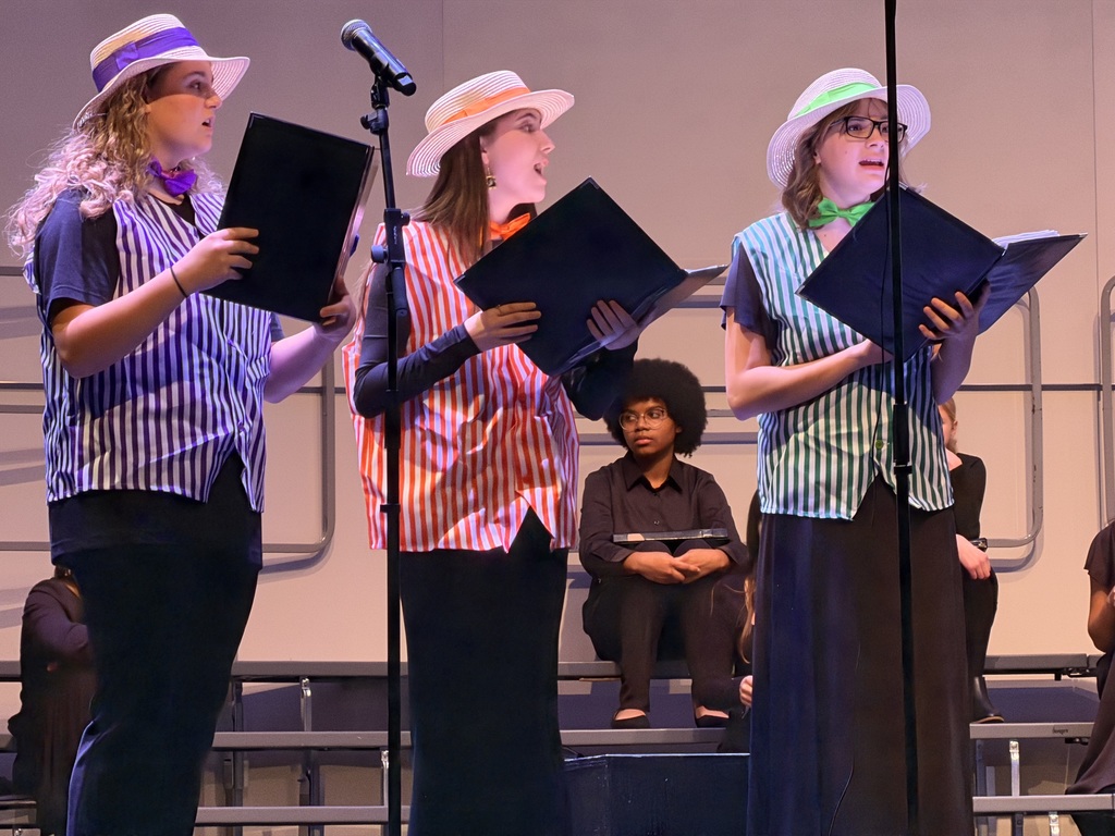 a picture of students singing